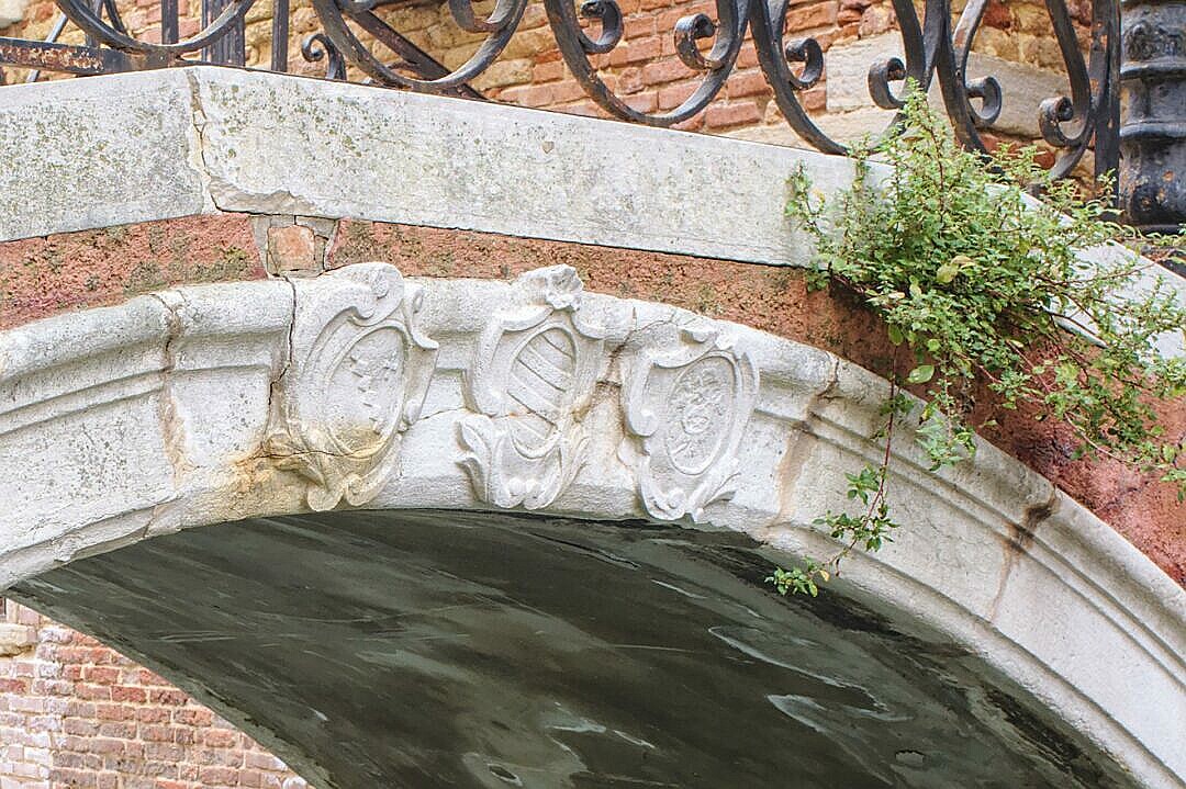 Coats of arms on a bridge in Venice
